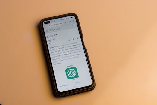 A smartphone displaying the Wikipedia page for ChatGPT, illustrating its technology interface.
