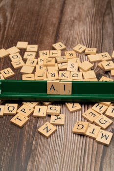 Scrabble tiles spelling 'AI' on a wooden surface symbolize artificial intelligence technology.